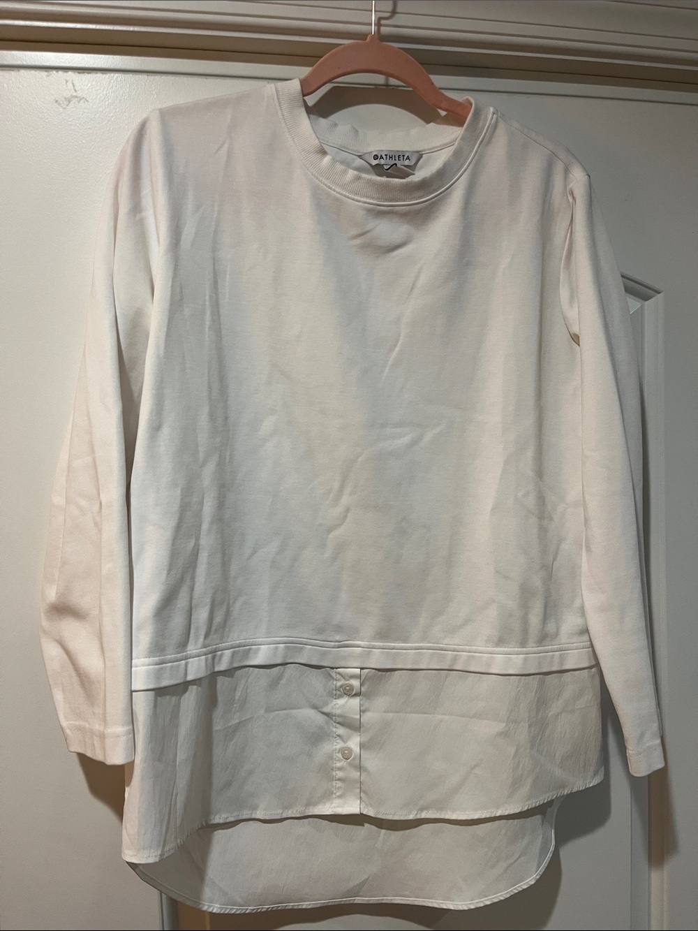 White sweatshirt with button down bottom
